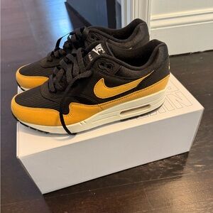Nike Women’s limited Edition Black and Gold Airmax Sneakers
